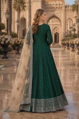 Green embroidered tapeta silk semi stitched anarkali suit 2