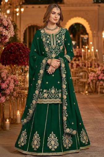 Green premium embroidered vichitra silk free size lehenga style suit UP To 42