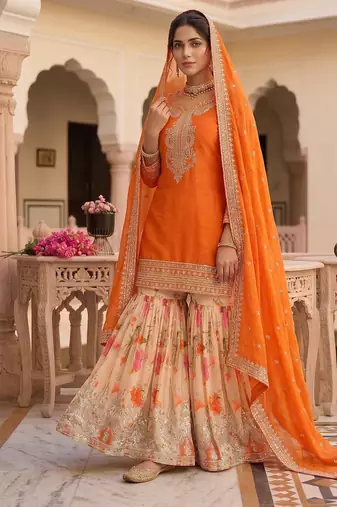 Festive orange heavy embroidery kurta floral sharara set with border dupatta