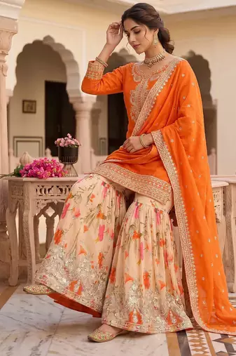 Festive orange heavy embroidery kurta floral sharara set with border dupatta
