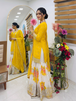 Festive yellow heavy embroidery kurta floral sharara set with border dupatta 3