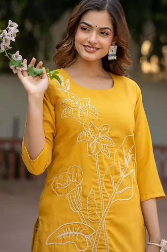 Women Floral Embroidered Cotton Kurta with Trousers