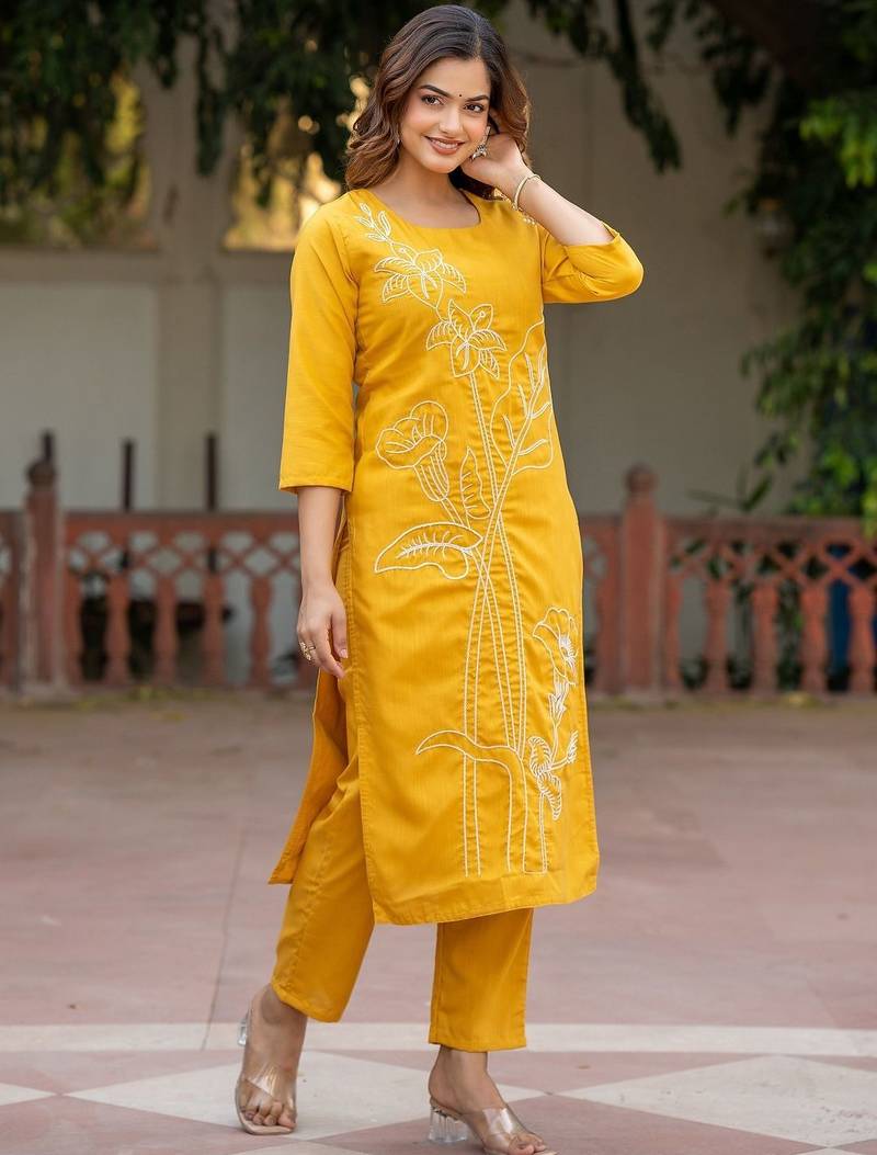 Women Floral Embroidered Cotton Kurta with Trousers