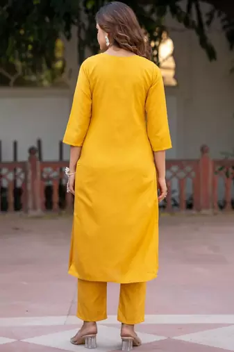 Women Floral Embroidered Cotton Kurta with Trousers