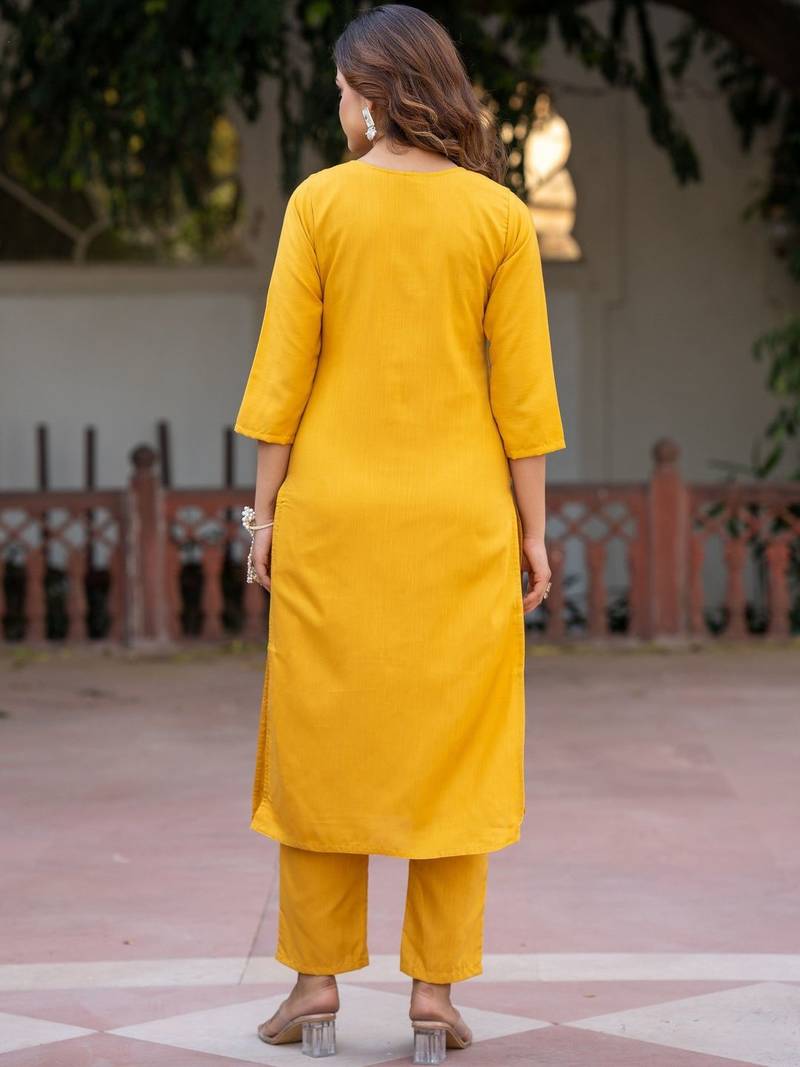 Women Floral Embroidered Cotton Kurta with Trousers