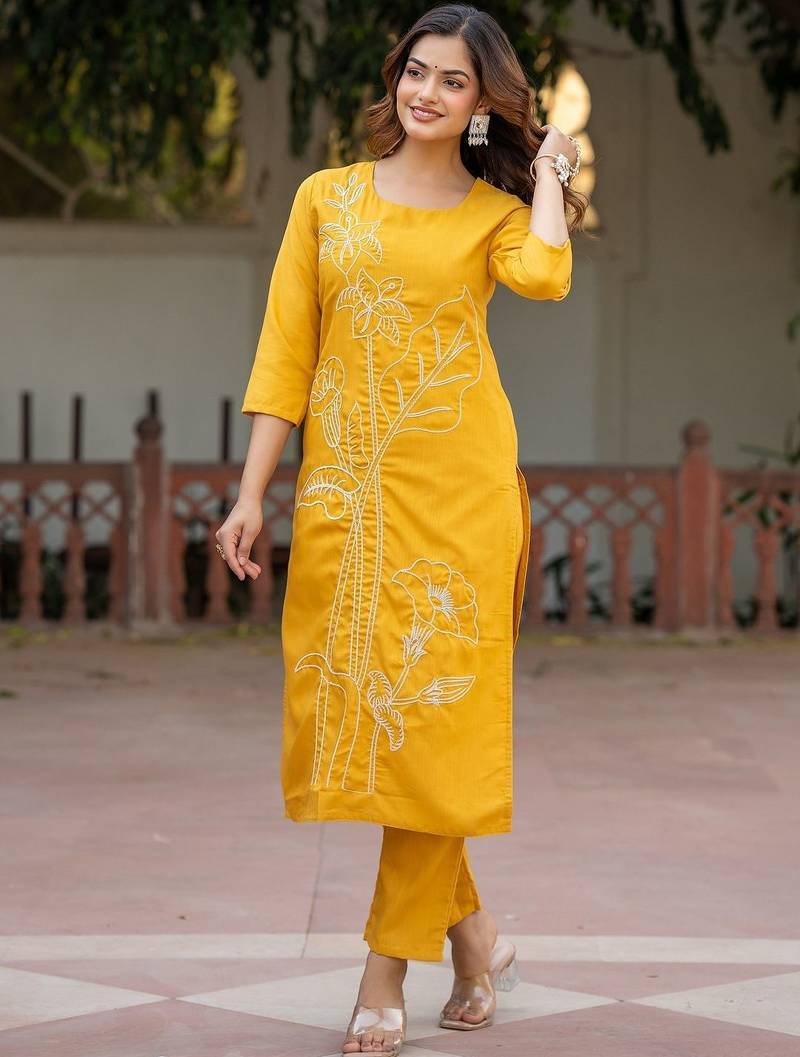 Women Floral Embroidered Cotton Kurta with Trousers