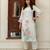 Women Floral Printed Knee Length Regular Pure Silk Straight Kurta with Trousers