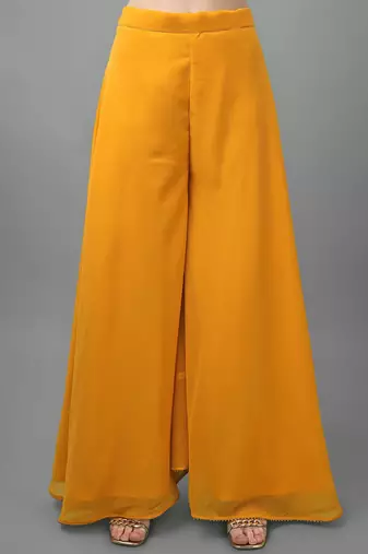 Women Yellow Ethnic Motifs Embroidered Sequinned Kurti with Sharara & With Dupatta