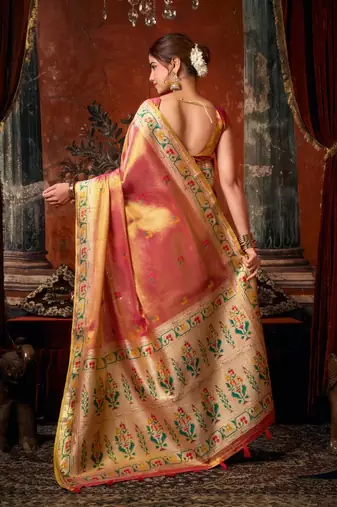 Rani pink premium tissue silk blend saree with tassels & blouse piece