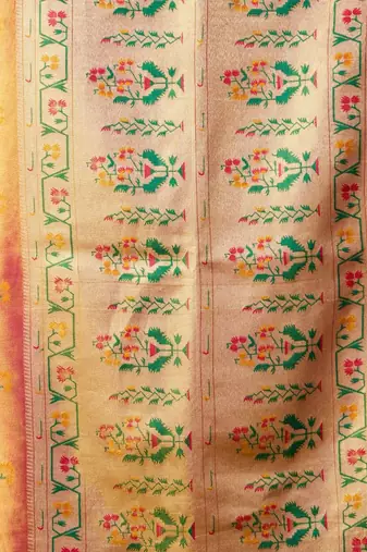 Rani pink premium tissue silk blend saree with tassels & blouse piece