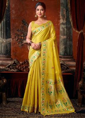 Yellow premium tissue silk blend saree with tassels & blouse piece 1