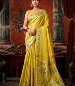 Yellow premium tissue silk blend saree with tassels & blouse piece