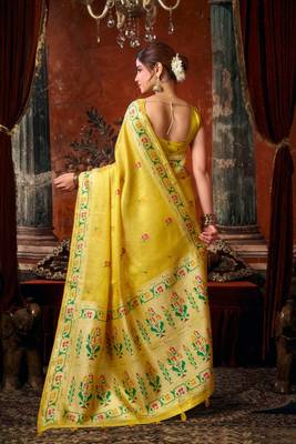 Yellow premium tissue silk blend saree with tassels & blouse piece 2