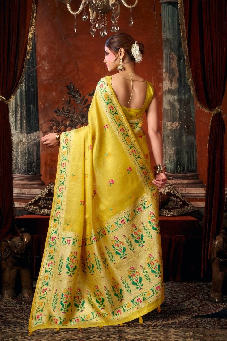 Yellow premium tissue silk blend saree with tassels & blouse piece