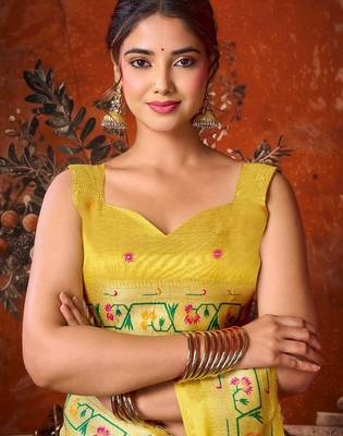 Yellow premium tissue silk blend saree with tassels & blouse piece 3