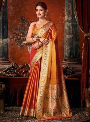 Orange premium tissue silk blend saree with tassels & blouse piece 1