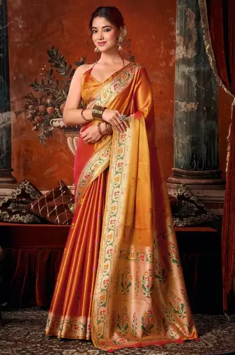 Orange premium tissue silk blend saree with tassels & blouse piece