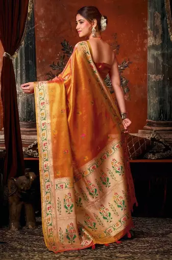 Orange premium tissue silk blend saree with tassels & blouse piece