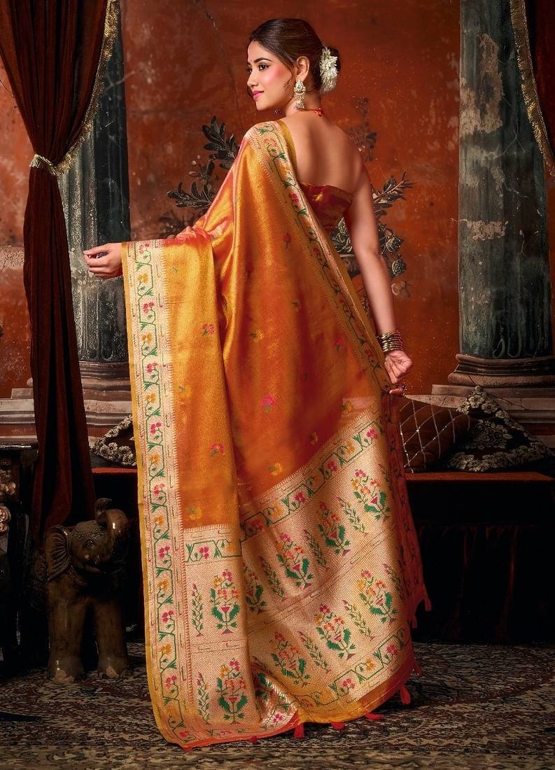 Orange premium tissue silk blend saree with tassels & blouse piece