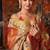 Orange premium tissue silk blend saree with tassels & blouse piece