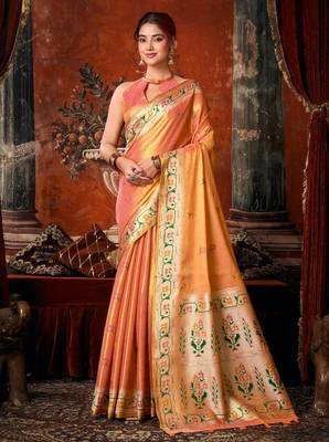 Peach premium tissue silk blend saree with tassels & blouse piece 1