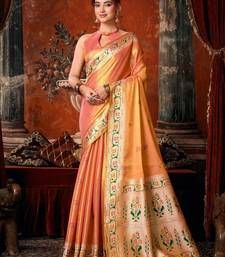 Peach premium tissue silk blend saree with tassels & blouse piece