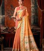 Peach premium tissue silk blend saree with tassels & blouse piece