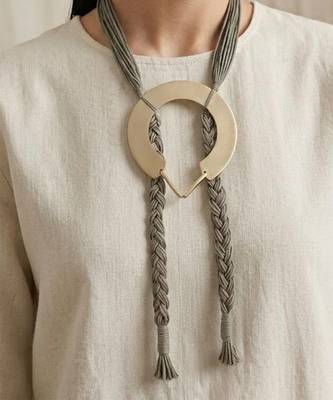Gold plated multi strand sage green orbit cords necklace 1