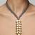 Gold plated grey knot necklace