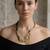 Gold plated black cords spiral cluster necklace
