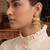 Gold plated focal bird stud earrings