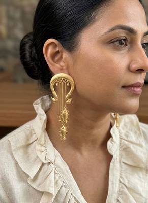 Gold plated matsya statement dangler earrings 1