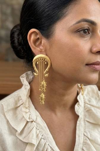 Gold plated matsya statement dangler earrings