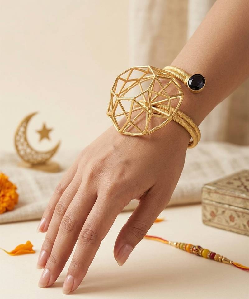 Gold plated black stone knotted chain bracelet