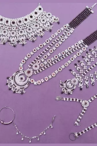 Purple 2-layer bridal jewelry set with earrings, maang tikka, pasha, nath & panja | rhodium plated