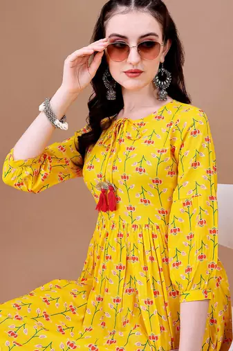 Yellow rayon fit &flared floral printed casual kurta for women