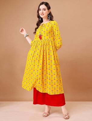 Yellow rayon fit &flared floral printed casual kurta for women 3