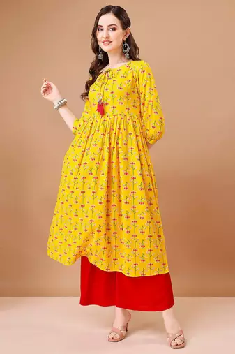 Yellow rayon fit &flared floral printed casual kurta for women