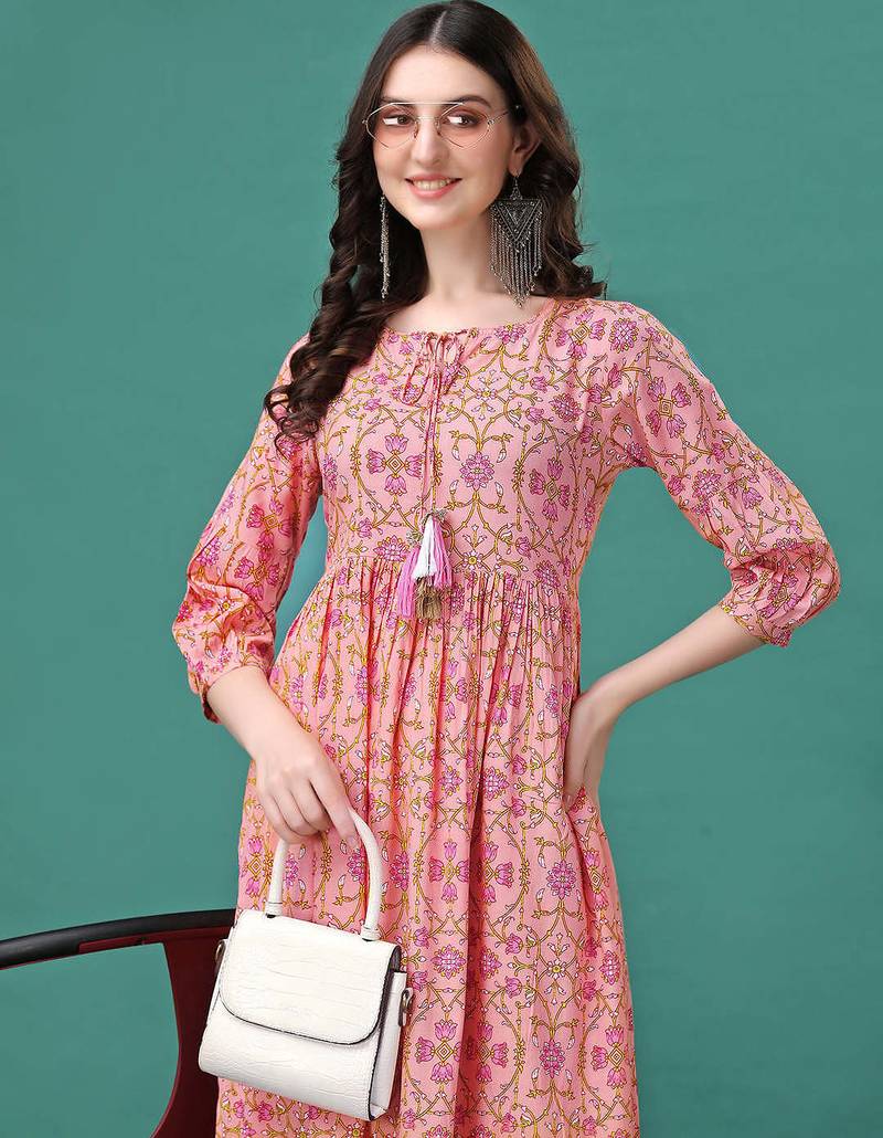 Peach rayon fit &flared floral printed casual kurta for women
