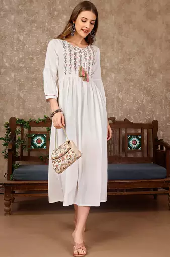 White rayon fit &flared thread work plain casual kurta for women