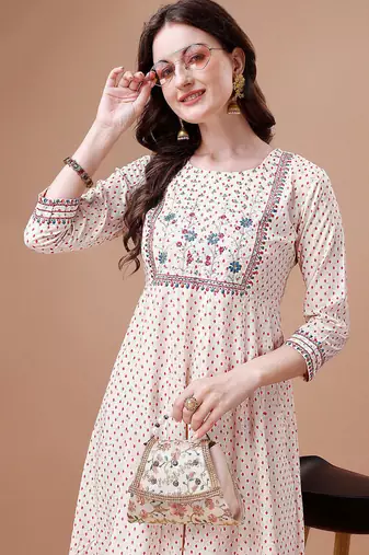 White rayon fit &flared dots printed casual kurta for women