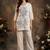 Women Ethnic Motifs Embroidered Regular Thread Work Pure Cotton Kurti with Trousers