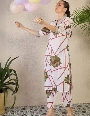Women Floral Printed Regular Pure Cotton Kurta with Trousers 1