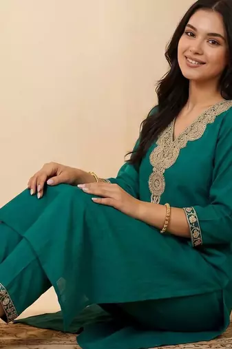 Women Ethnic Motifs Embroidered Regular Thread Work Kurta with Trousers