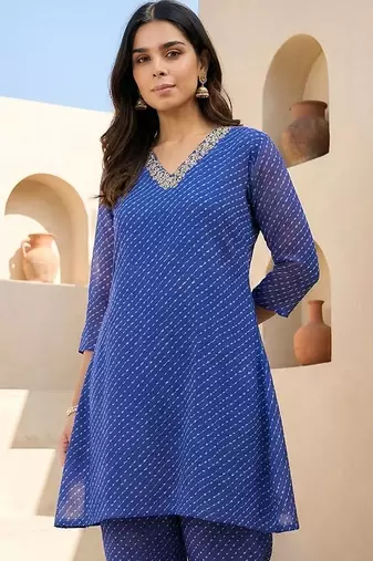 Women Ethnic Motifs Printed Regular Thread Work Kurti with Trousers