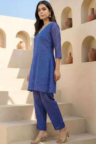 Women Ethnic Motifs Printed Regular Thread Work Kurti with Trousers