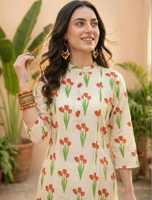 Women Floral Printed Regular Pure Cotton Kurta with Trousers 1