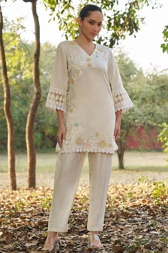 white floral embroidered regular thread work  cotton kurta with trousers