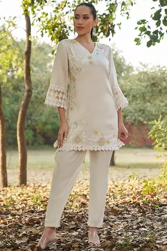 white floral embroidered regular thread work  cotton kurta with trousers