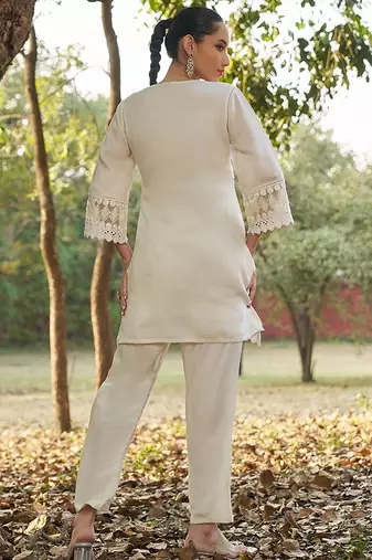 white floral embroidered regular thread work  cotton kurta with trousers